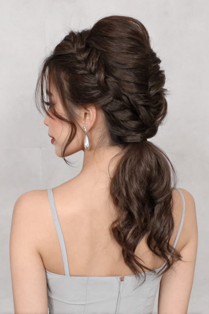 17 Stunning Half Up Half Down Pigtails to Try Today 3 A person with braided half up half down pigtails hairstyle