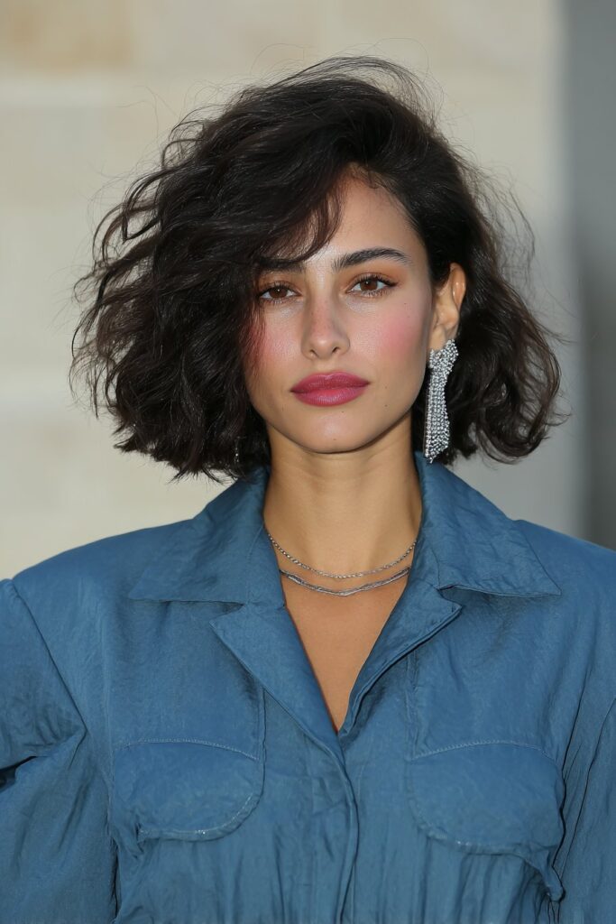 Girl with chic bob and flipped ends.