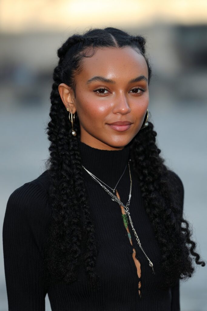 Classic Medium Knotless French Curl Braids on a woman with curly braid ends