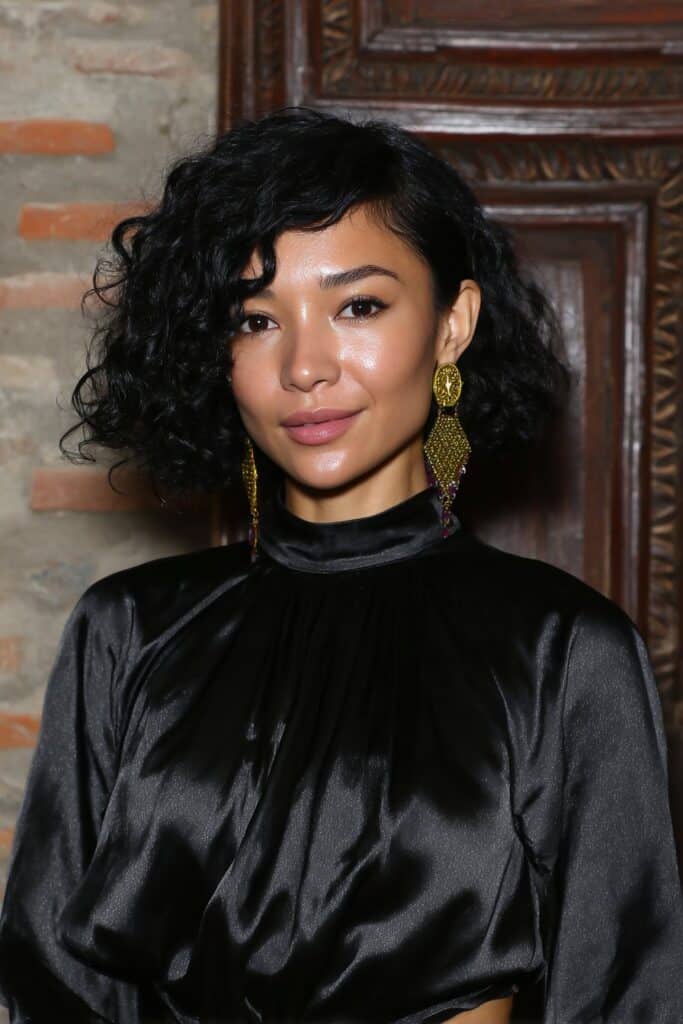 Woman with a sleek curled-under classic bob style