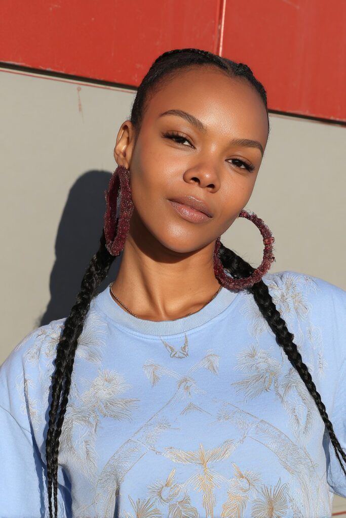 girl with french curl bob braids