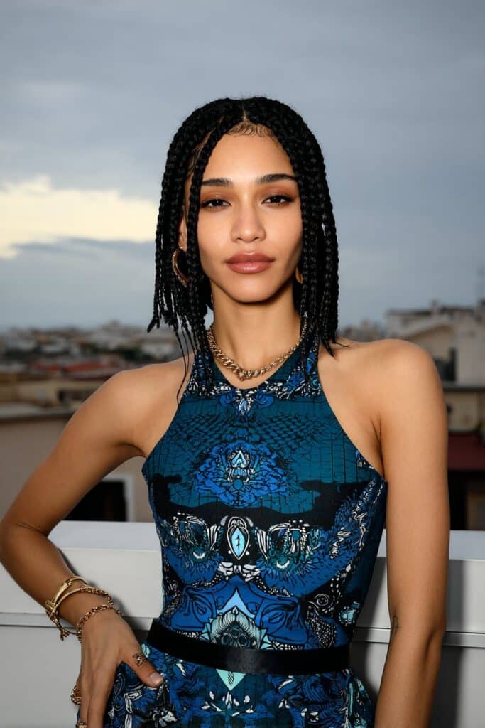Woman wearing bohemian shoulder-length knotless braids