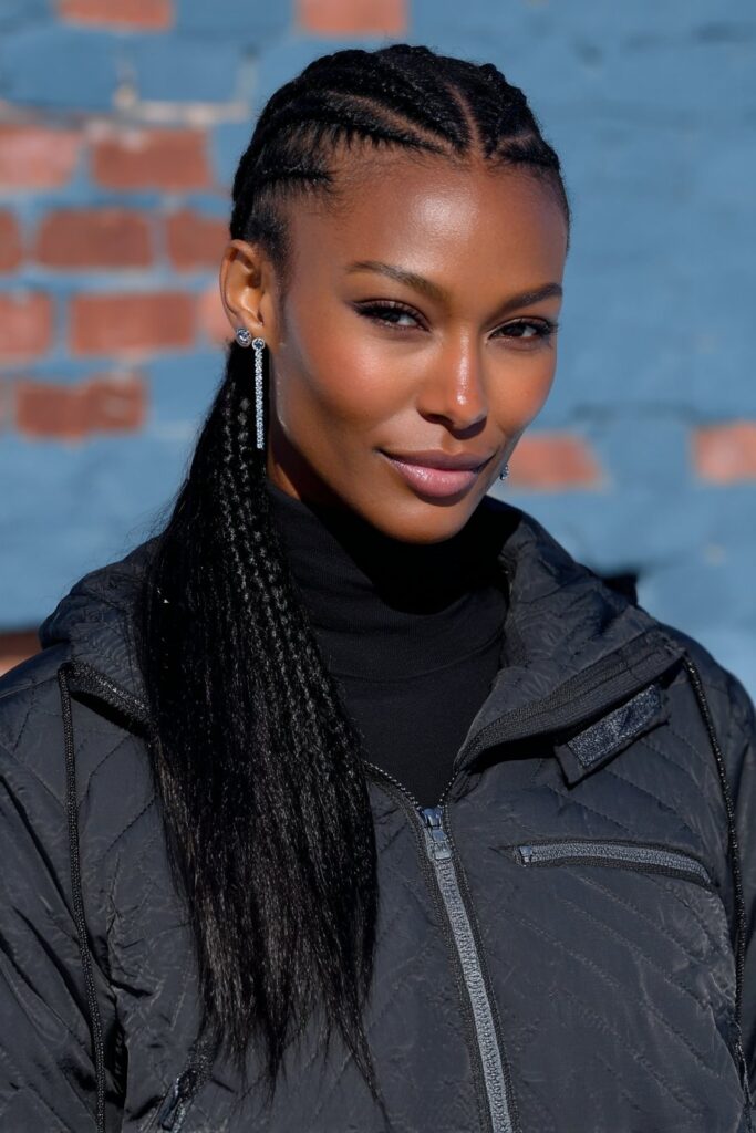 Girl with side-swept braids for a soft look