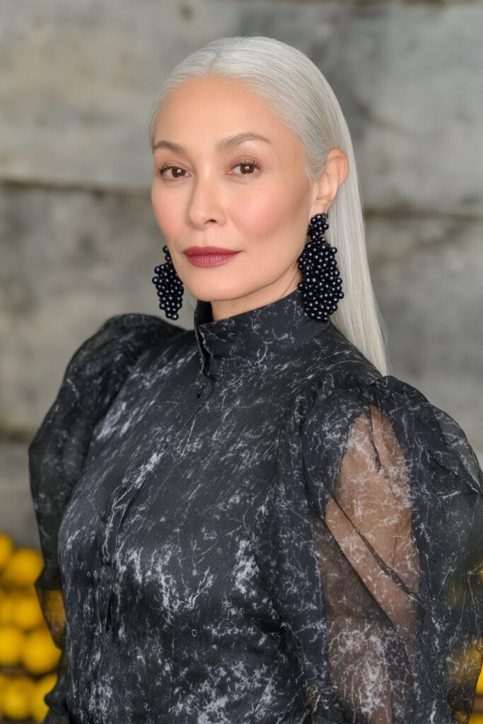 Sleek side-parted pixie haircut offering polished, professional sophistication.