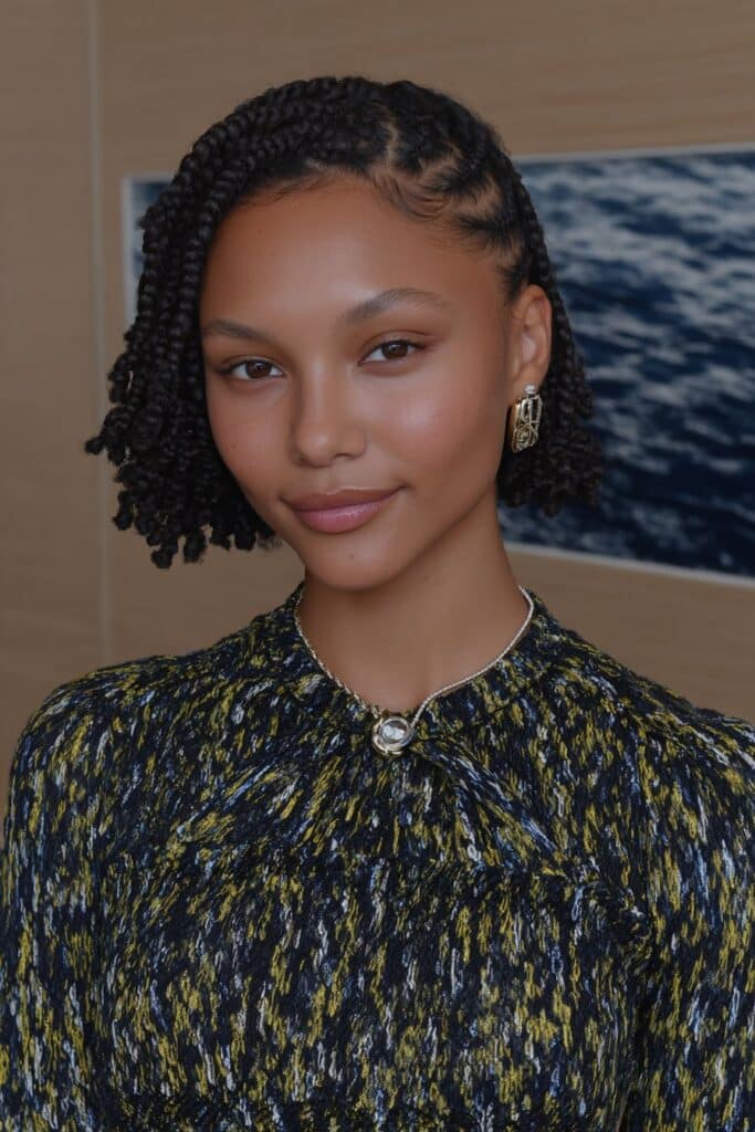 girl with small knotless bob braids