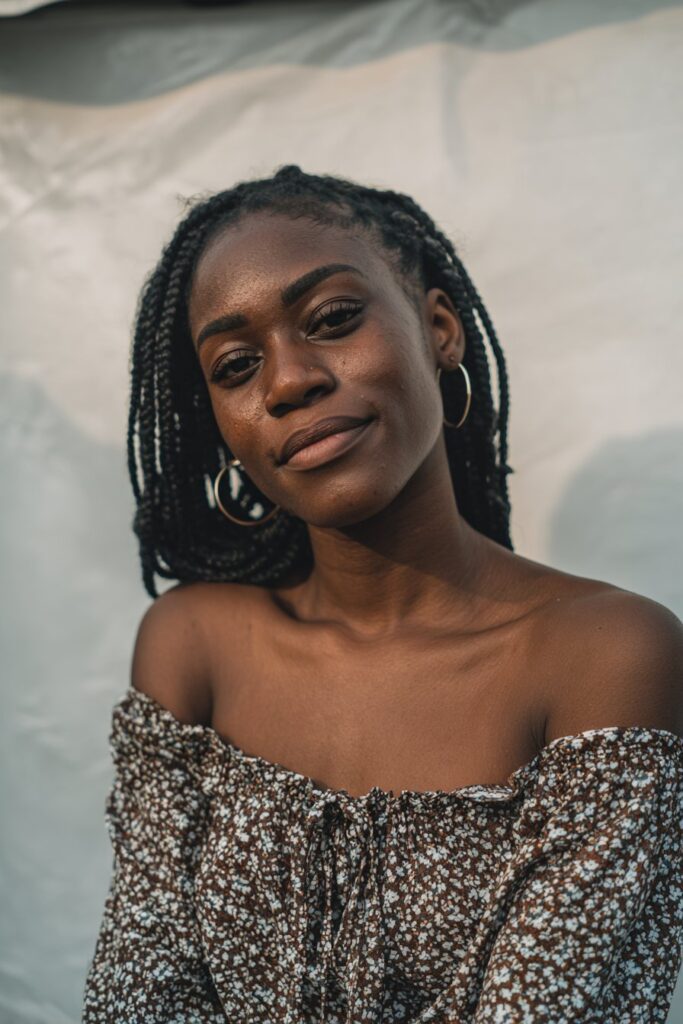 Long braids mixed with loose, wavy strands for a carefree, bohemian look.