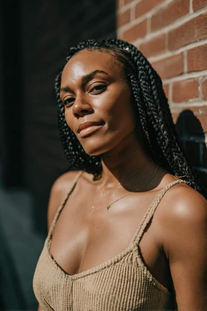 Chunky, textured braids with looped, flutter-like pieces creating a soft, voluminous effect.