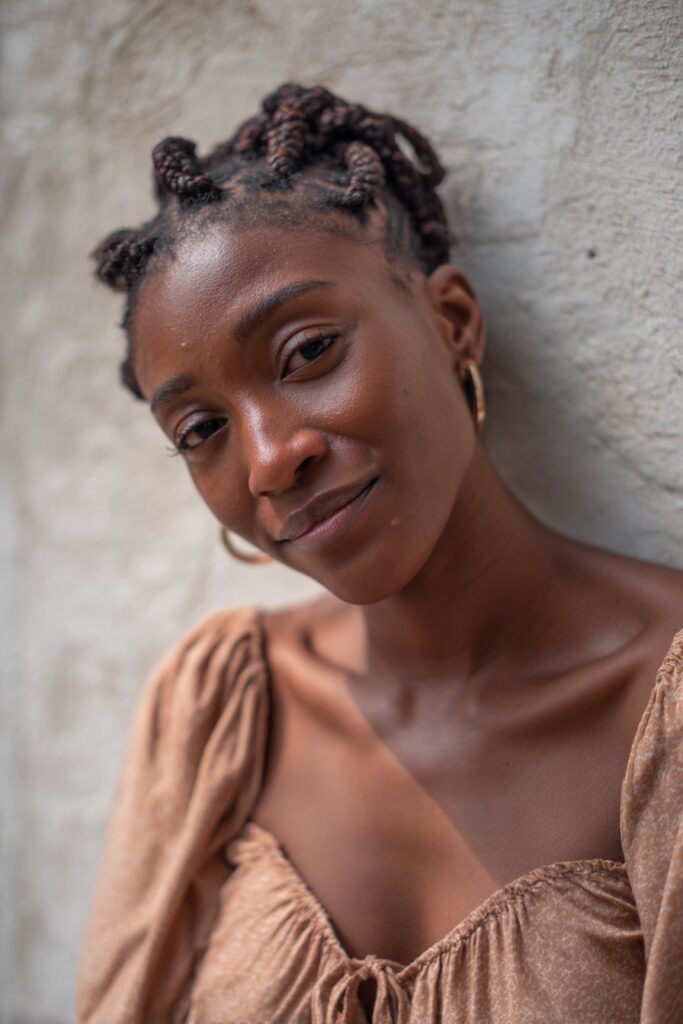 Sleek braids where hair is gradually added to create a natural, seamless transition from thin to thick.