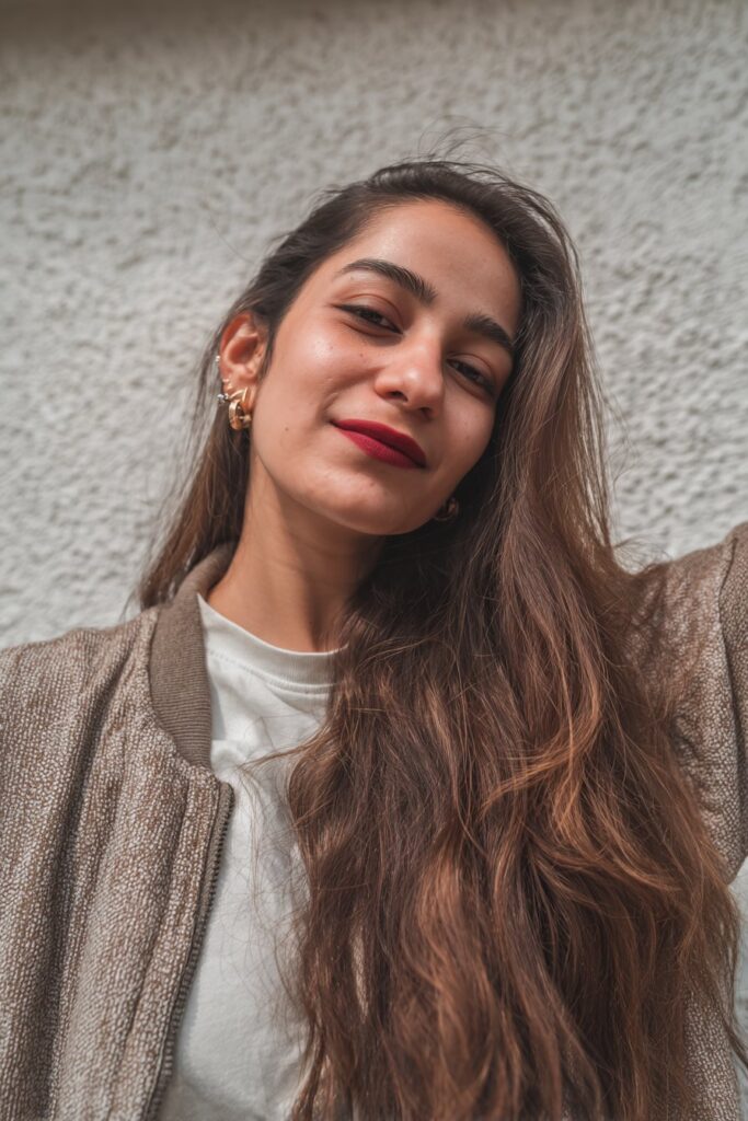 Light brown hair detailed with ultra-fine sugar-colored babylights for subtle brightness.