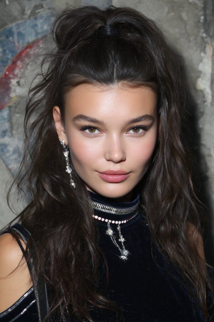 A relaxed low messy bun that combines comfort and effortless charm for everyday school wear.