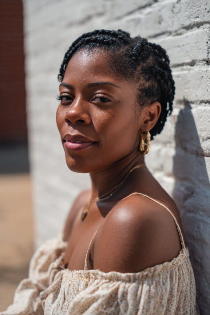 Short bob-length braids with a blunt, polished silhouette.