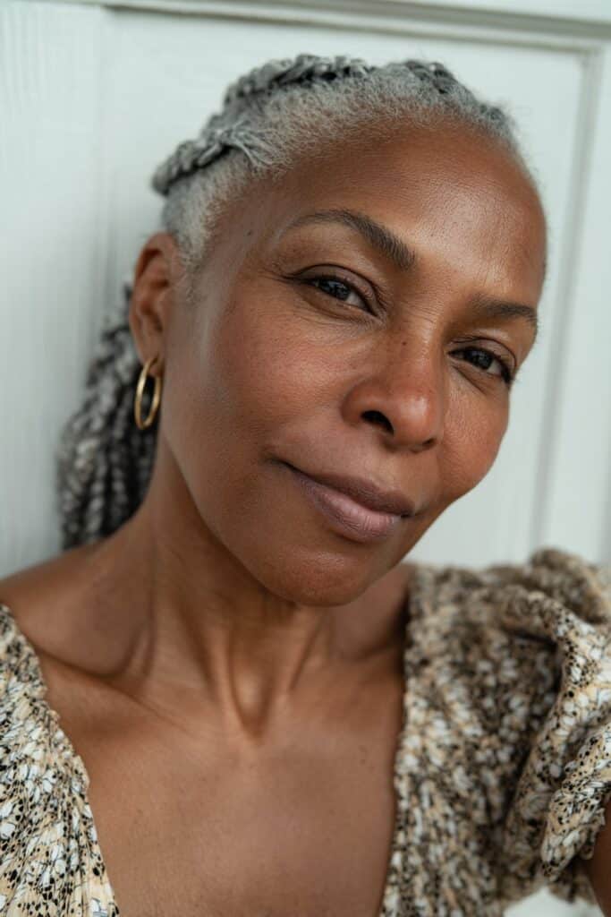 Shoulder-length bob made of silver-colored braids with clean ends and structured shaping.