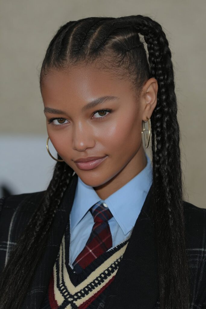 School girl wearing a sleek braided ponytail, keeping hair tidy and stylish during school activities.