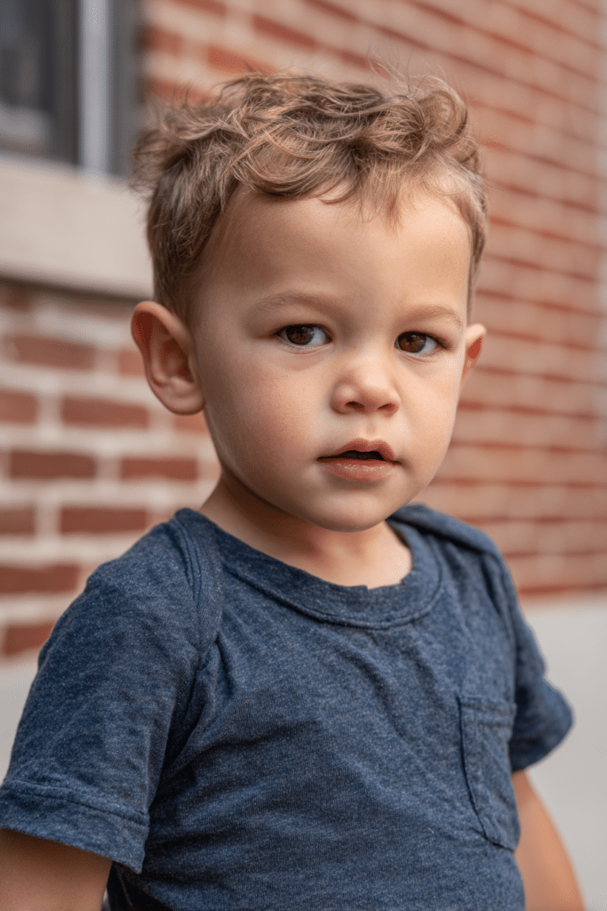 Trendy mullet haircut for toddler boy