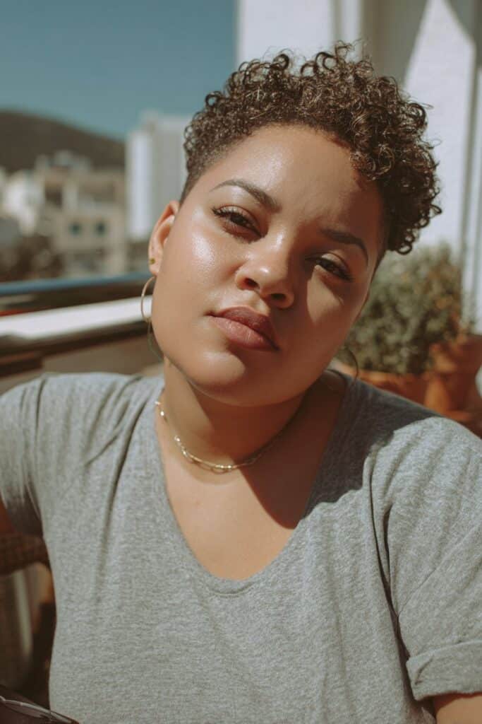 Curly pixie haircut ideal for thin hair and fat face