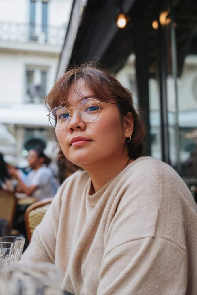 French bob hairstyle with curtain bangs for women.