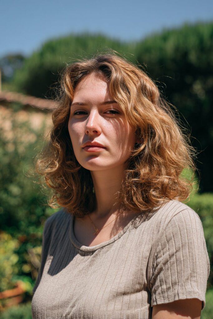 Layered shoulder-length shag haircut for curly hair