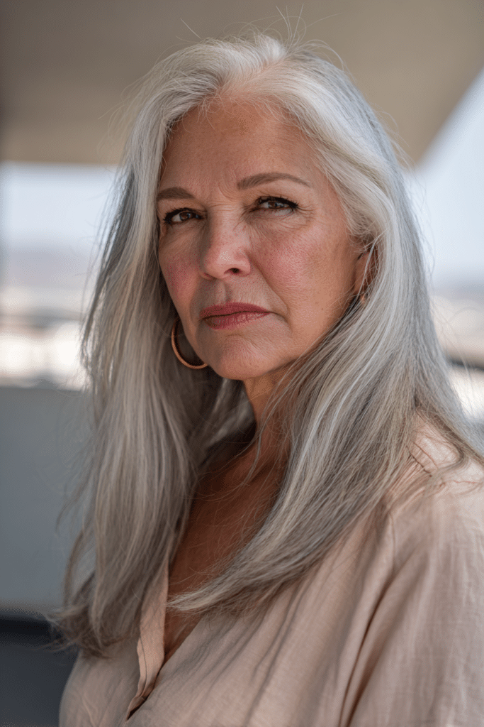 Long silver hair with soft face-framing layers