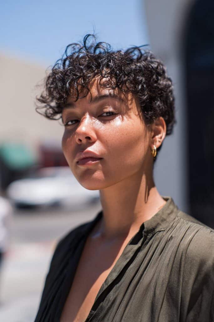Pixie curly shag haircut with bangs