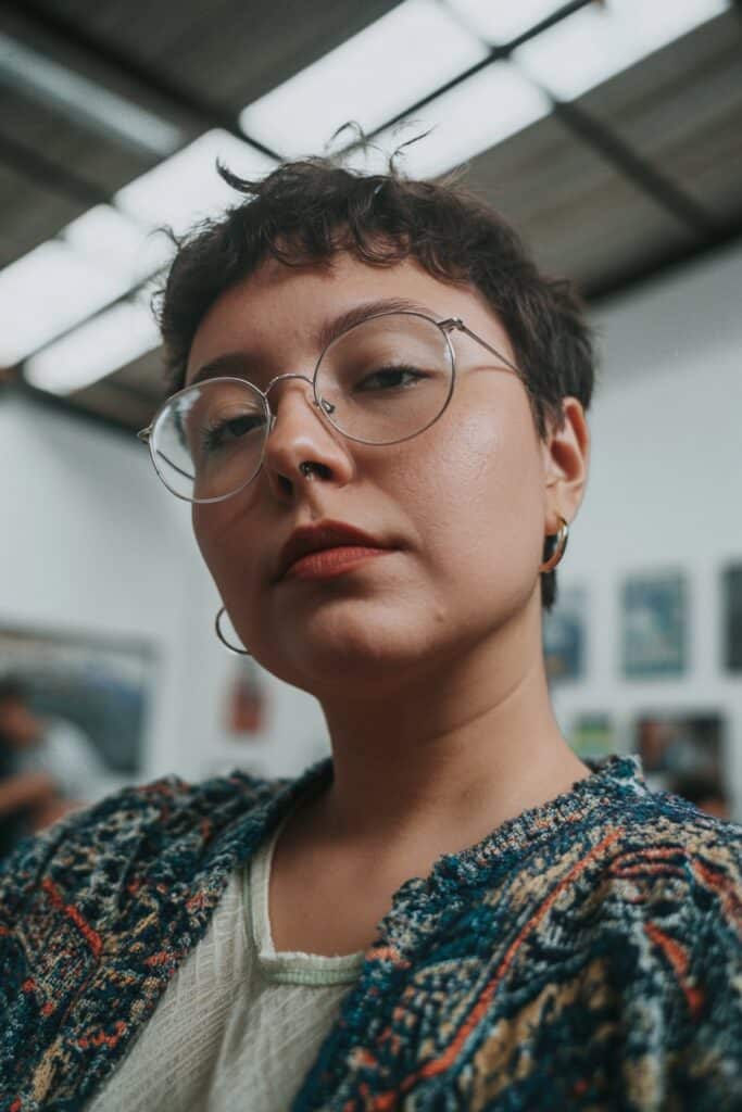 Razored pixie haircut with volume for women.