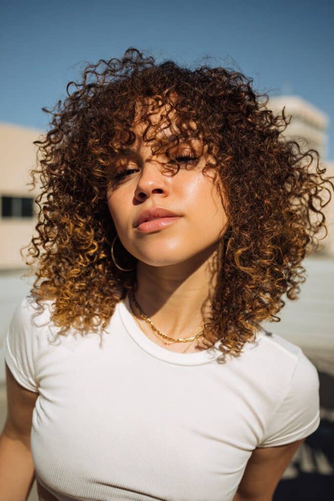 Shaggy curly haircut with defined ringlets