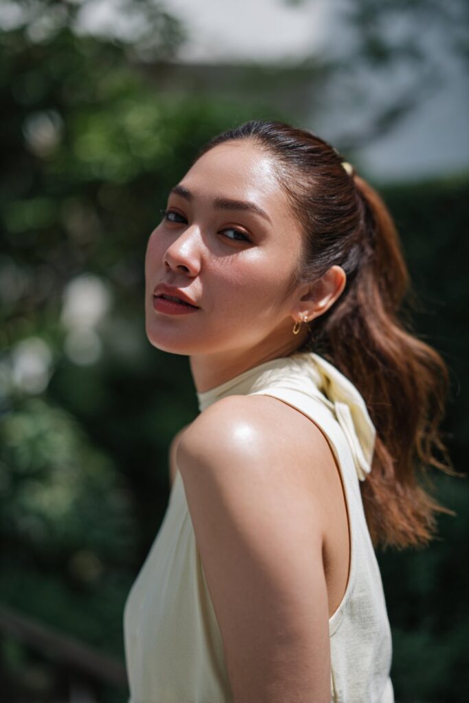 Bridesmaid side hairstyle ponytail wrapped with ribbon