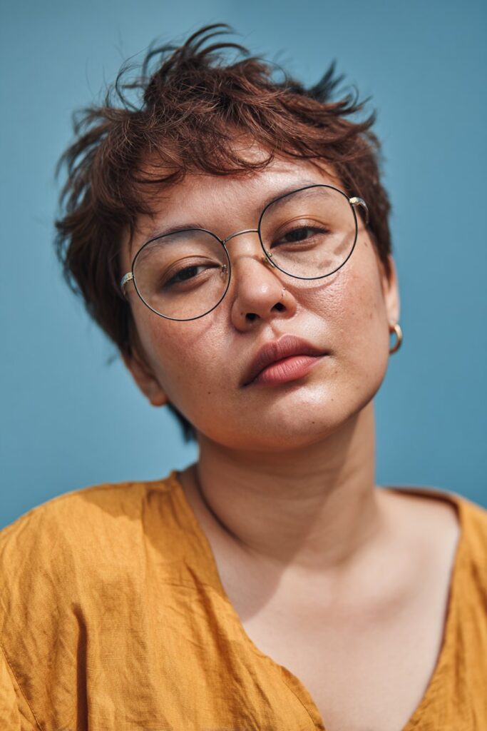 Textured pixie cut hairstyle for women with short hair.