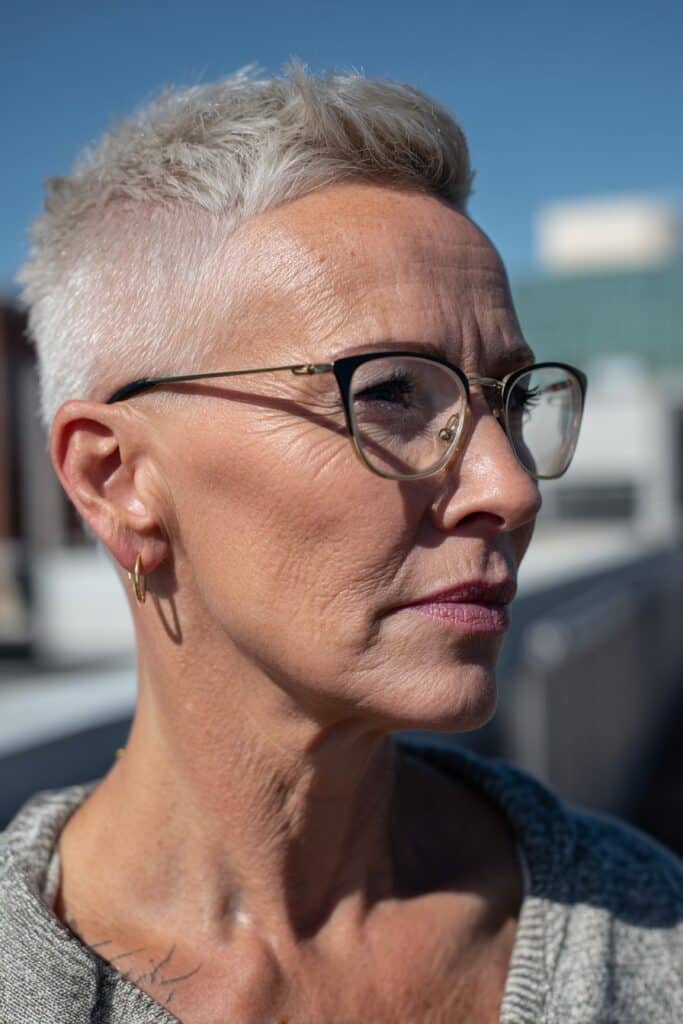 Undercut pixie hairstyle with short sides