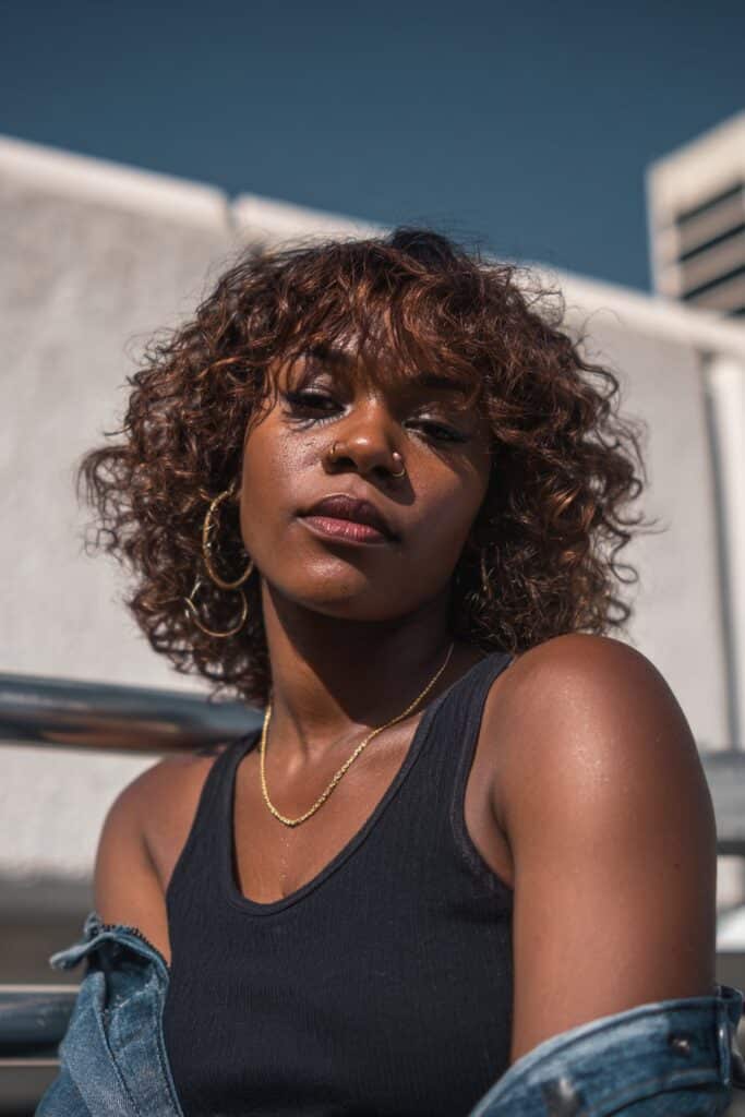 Curly bob with layers for Black women, short layered hairstyle