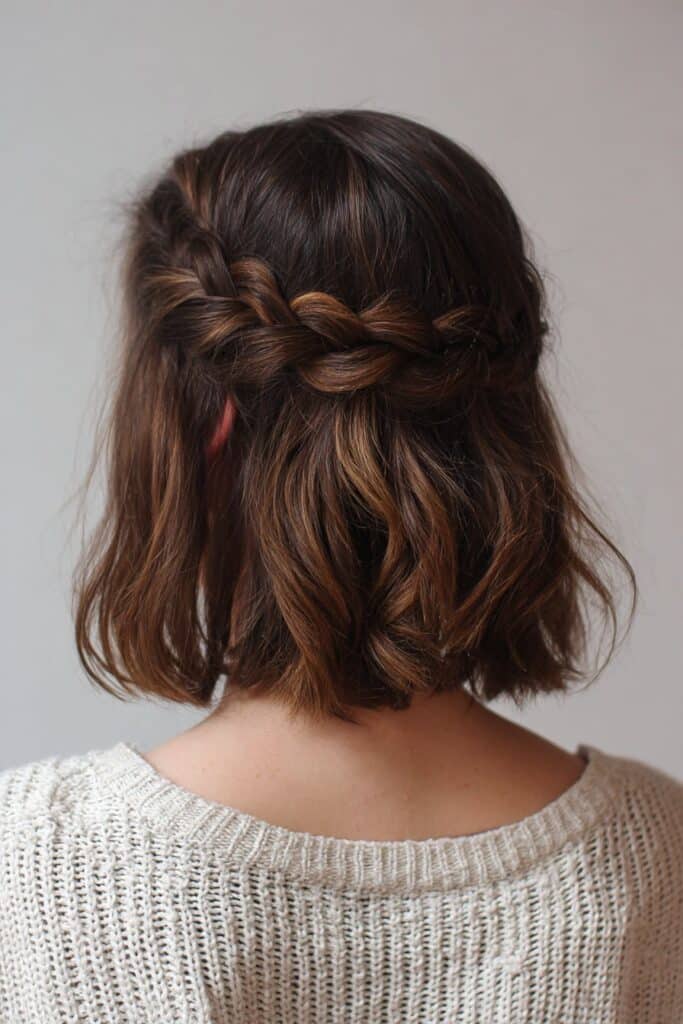 Half-up French braid gym hairstyle for short hair