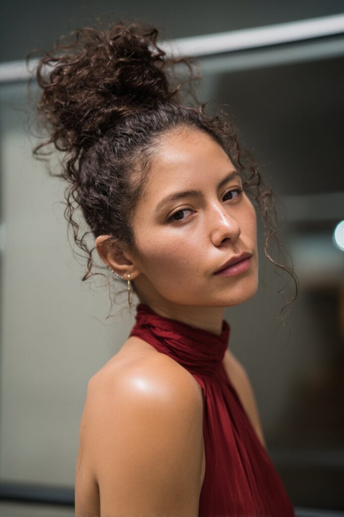 High textured bun formal prom hairstyle with elegant volume