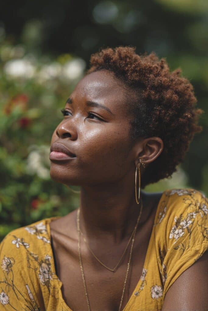 Mini afro TWA hairstyle for Black women, short natural haircut