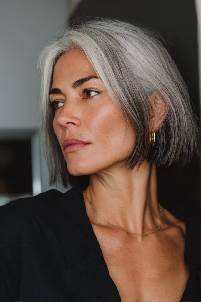 Sleek chin-length bob with subtle movement hairstyle for women over 40