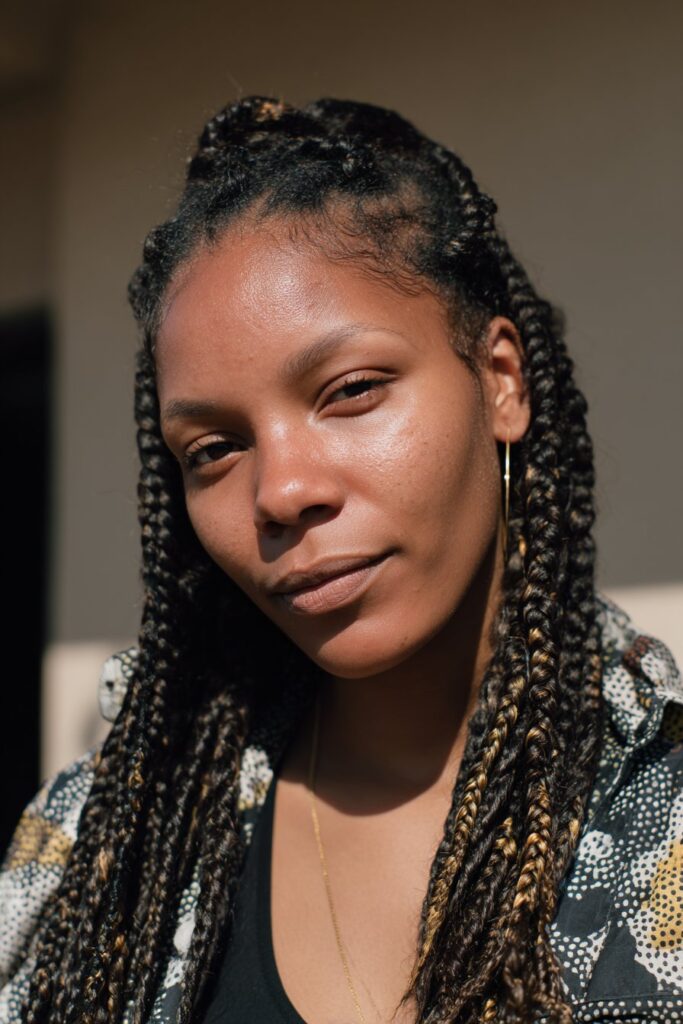 Ash brown peekaboo boho braids with soft waves