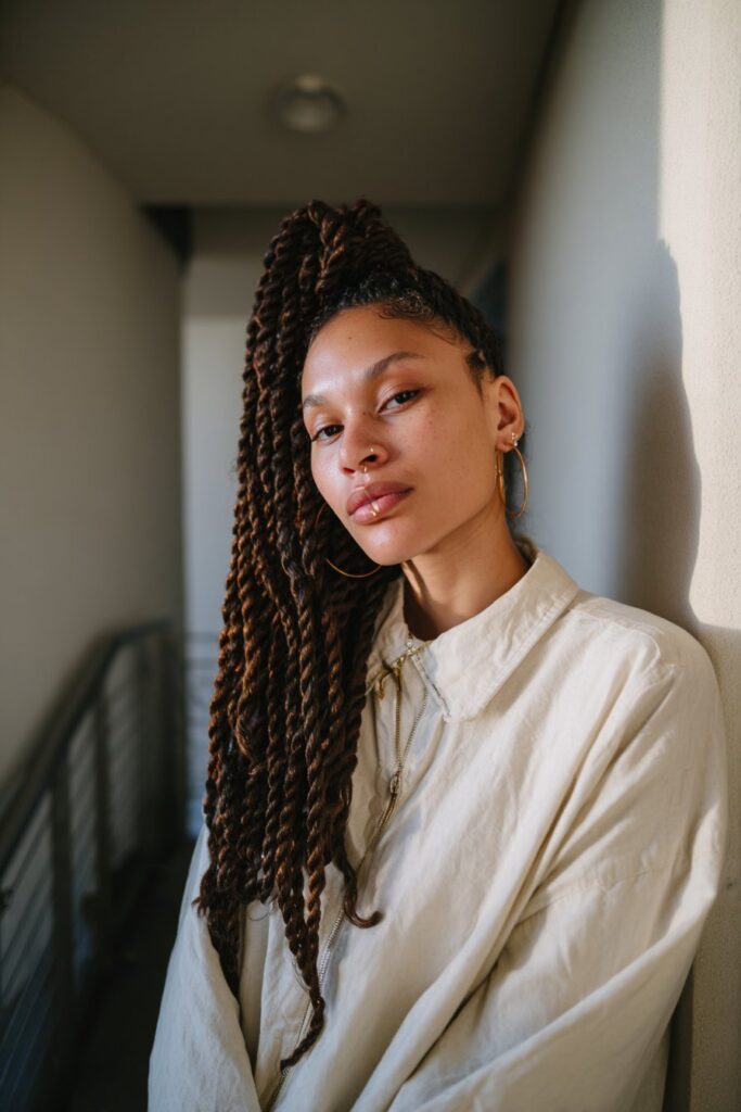 Asymmetrical jumbo knotless braids with uneven lengths