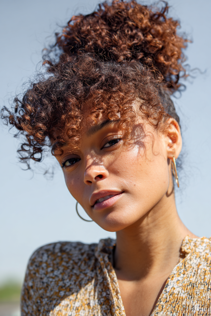 Half up half down spring twist protective style for versatility