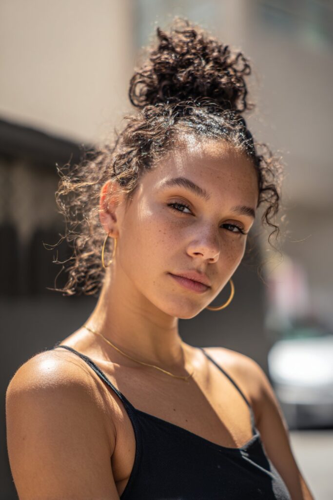 High bun spring twist protective hairstyle for natural hair