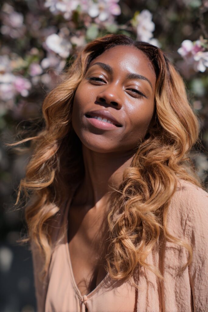 Honey blonde balayage with soft waves spring hairstyle for Black women