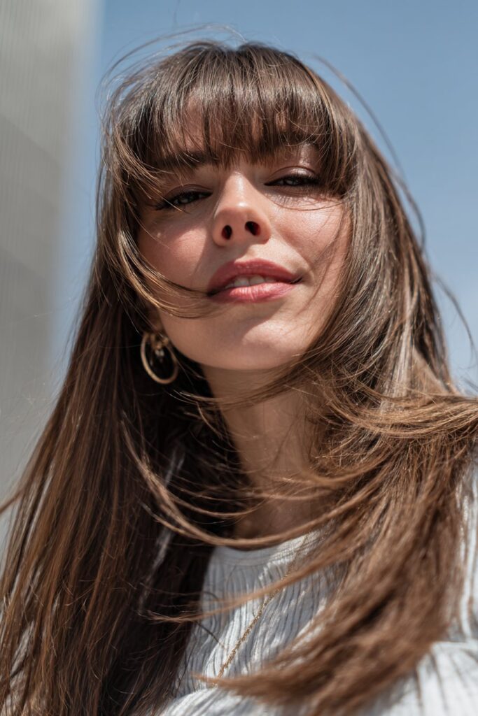 Medium shag haircut with curtain bangs