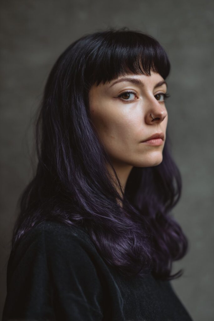 Electric blue goth bob haircut with bold color and no fringe