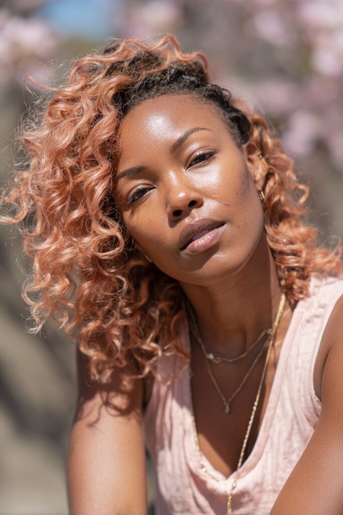 Soft peach balayage on natural hair spring hairstyle for Black women