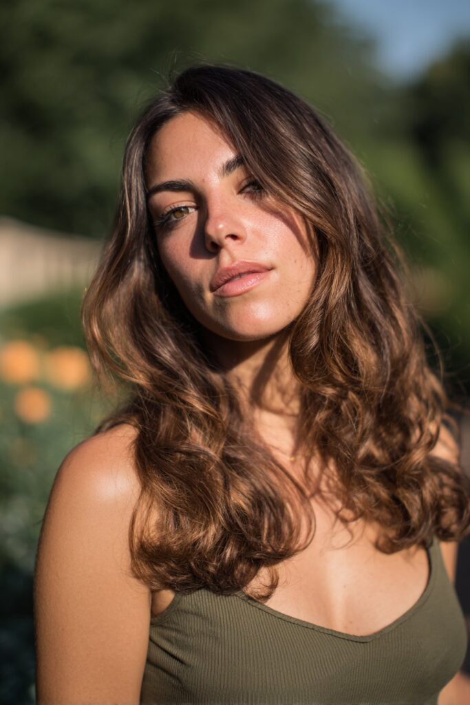 Chocolate brown sunkissed brunette hair with soft highlights
