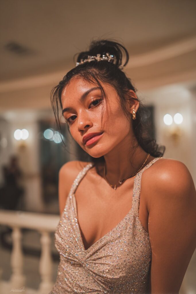 Half up half down prom hairstyle glam headband style