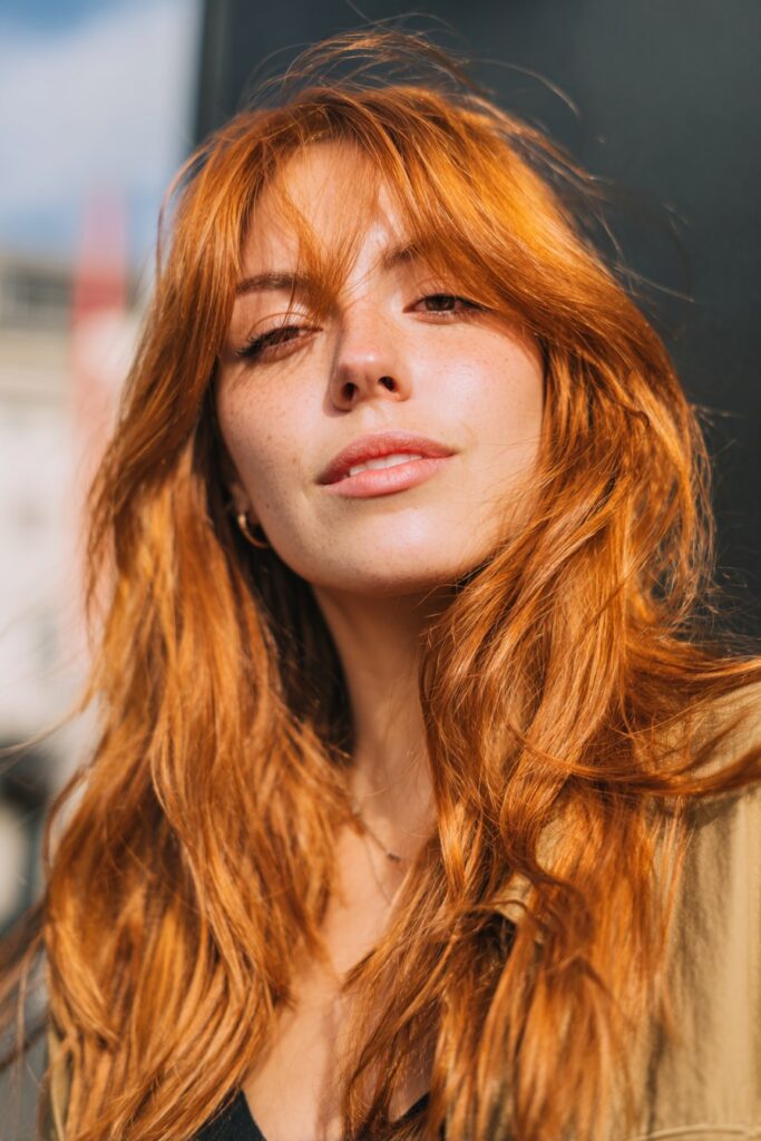 Golden copper summer red hair color with sunlit shine