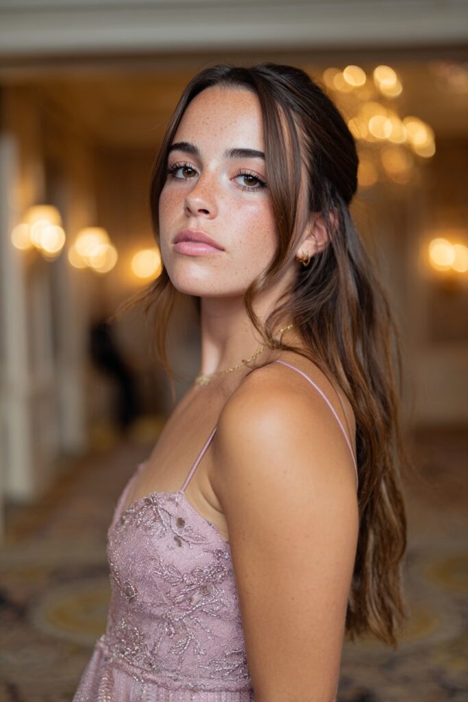 Half up half down prom hair straight with volume