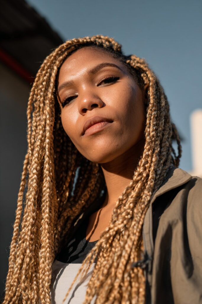 Honey blonde box braids bohemian style