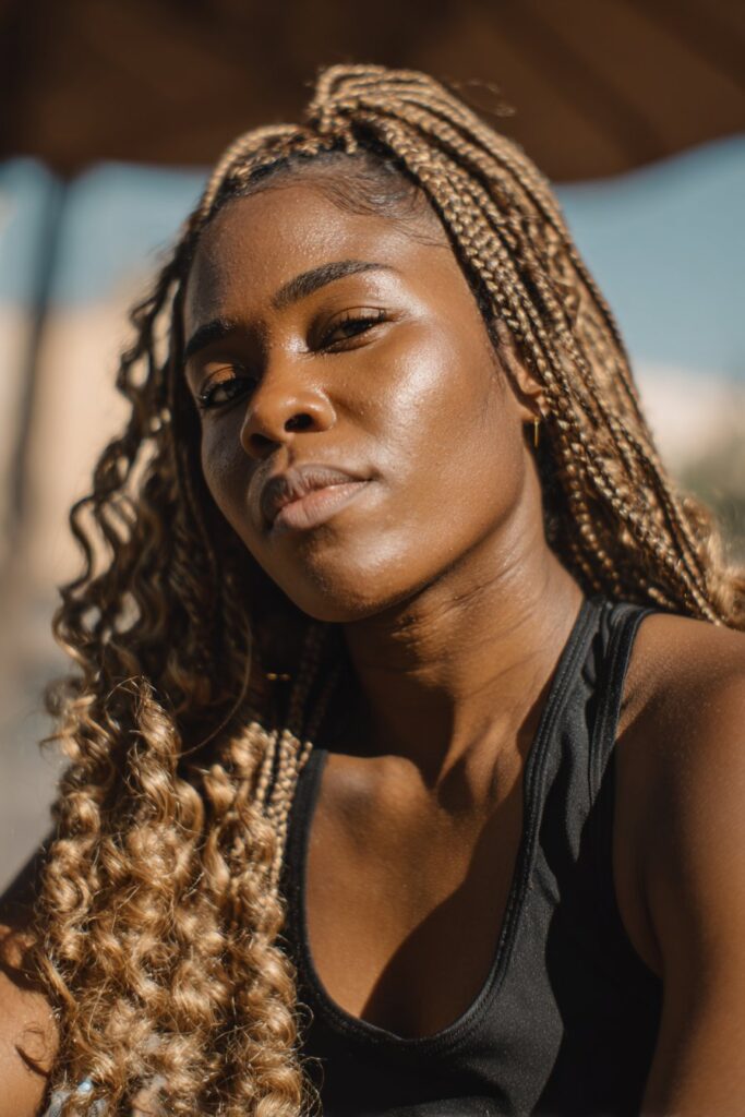 Honey blonde box braids boho braids with curls