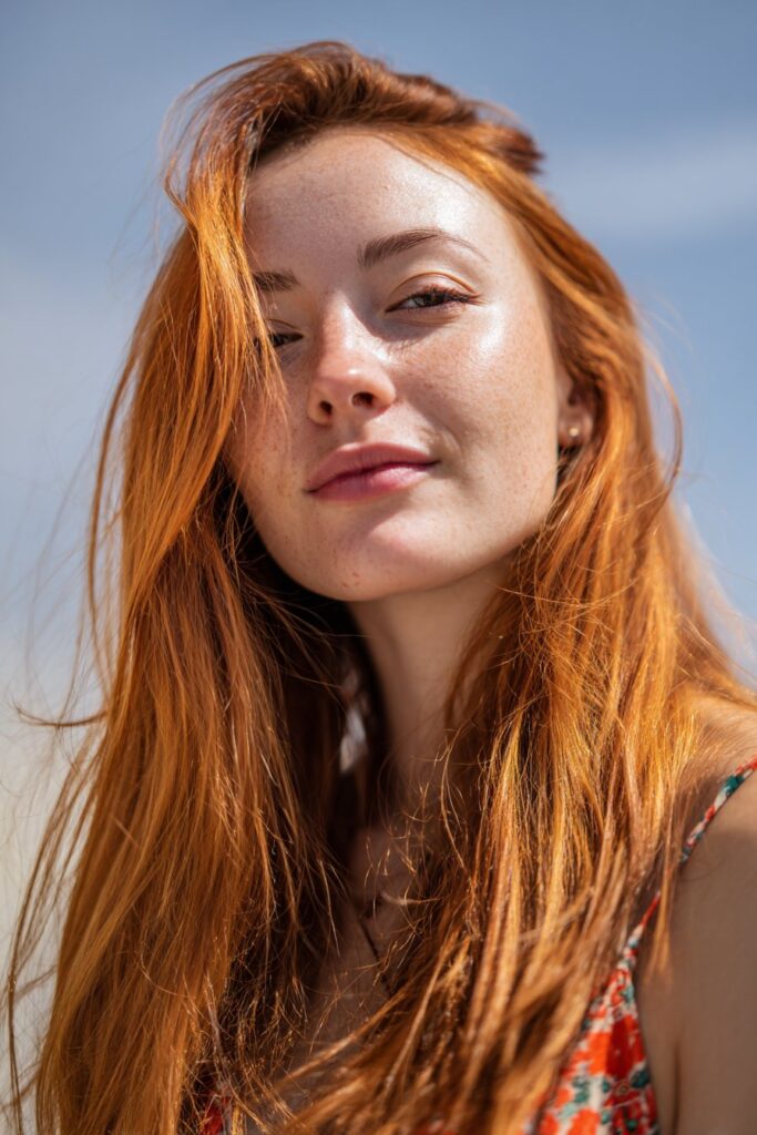 Light auburn summer red hair color with natural shine