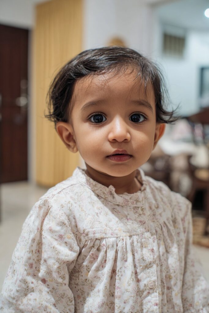 Infant baby girl short hair sleek side part style