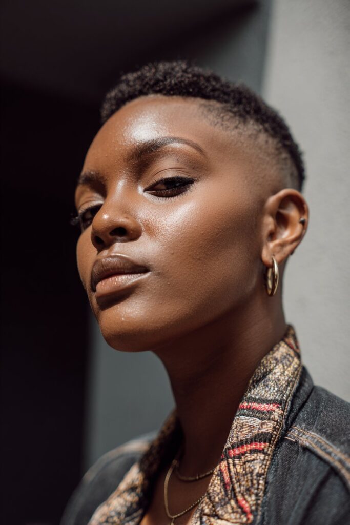 Low maintenance short natural haircut for black female faux hawk